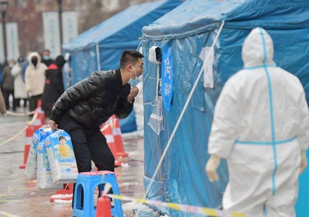 PHOTO: A man undergoes testing during a citywide mass testing for COVID-19 in Changchun, Jilin province, China, on March 13, 2022. (Stringer/via Reuters)
