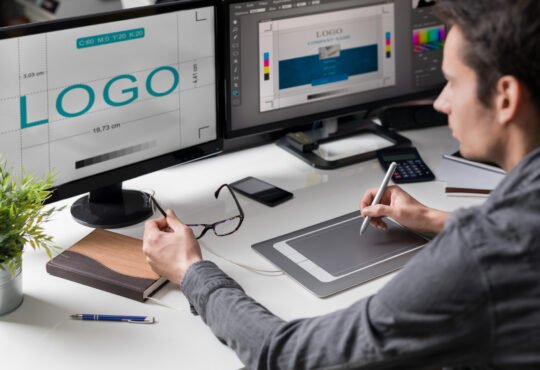 Graphic designer at work. Color samples.
